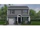 Charming two-story home featuring gray siding, black shutters, and a well-manicured front lawn at 5449 Baybrook Cir, South Fulton, GA 30349
