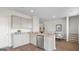Kitchen with granite countertops, gray cabinets, stainless steel appliances, and wood flooring at 5449 Baybrook Cir, South Fulton, GA 30349