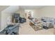 Spacious living room features an exercise area and a comfortable seating area at 115 Glen Echo Dr., Covington, GA 30016
