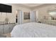 Spacious main bedroom features neutral walls, a ceiling fan, and natural light at 11755 Lovejoy Crossing Blvd, Hampton, GA 30228