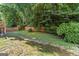 Spacious backyard has a privacy fence that defines its perimeter, offering seclusion at 1504 Oglethorpe Dr, Suwanee, GA 30024