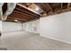 Spacious basement featuring carpet flooring, an open ceiling and windows at 1504 Oglethorpe Dr, Suwanee, GA 30024