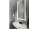 Cozy bathroom with vintage mirror and sink at 1504 Oglethorpe Dr, Suwanee, GA 30024