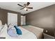 Bedroom view showing the ceiling fan and other items in the room at 1504 Oglethorpe Dr, Suwanee, GA 30024