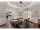 Chic dining area with statement lighting and elegant decor, perfect for formal gatherings at 1504 Oglethorpe Dr, Suwanee, GA 30024
