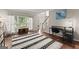 Bright living space with natural light and open layout, creating a welcoming atmosphere at 1504 Oglethorpe Dr, Suwanee, GA 30024