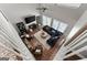 Aerial view showcases an open-concept living area with modern furnishings and fireplace at 1504 Oglethorpe Dr, Suwanee, GA 30024