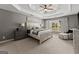 Serene main bedroom with tray ceilings, soft lighting, and ample space for relaxation at 1504 Oglethorpe Dr, Suwanee, GA 30024