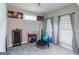 Bright basement gym with modern exercise equipment and ample natural light at 5490 Bent Grass Way, Douglasville, GA 30135