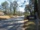 View of a street, a mailbox, and a home with curb appeal at 1876 Sw Sandtown Sw Rd, Atlanta, GA 30311