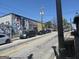 Street view of parked cars alongside a building with an artistic mural in a commercial area at 1876 Sw Sandtown Sw Rd, Atlanta, GA 30311
