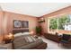 Cozy bedroom featuring stylish decor, a comfortable bed, and a bright window view at 548 Thomas Downs Way, Jonesboro, GA 30238