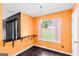 Eat-in kitchen area featuring large bright window with a view of the landscaped backyard at 548 Thomas Downs Way, Jonesboro, GA 30238