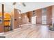 Open living area featuring modern flooring, fireplace and stairs to upper level at 548 Thomas Downs Way, Jonesboro, GA 30238