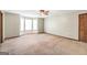 Spacious bedroom with a ceiling fan and a bay window at 175 Laney Ct, Mcdonough, GA 30252
