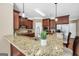 Kitchen with granite countertops and stainless steel appliances at 204 Carmell Ct, Mcdonough, GA 30252