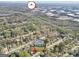 Aerial neighborhood view with Southlake Mall in the distance and home's location highlighted at 758 King Rd, Jonesboro, GA 30236