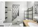 Bathroom with a tiled shower and modern fixtures at 758 King Rd, Jonesboro, GA 30236