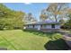 Charming single-story home with a well-maintained lawn and inviting curb appeal during daytime at 758 King Rd, Jonesboro, GA 30236