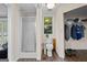 Convenient bathroom featuring a walk-in shower, toilet, window and storage for essentials at 7138 Rockland Rd, Lithonia, GA 30038