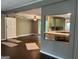 An open-concept living area features updated flooring and sightlines to the kitchen at 7138 Rockland Rd, Lithonia, GA 30038