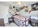Cozy bedroom with charming decor, a ceiling fan, and carpet floors offers a comfortable private space at 8870 Dornoch Cir, Winston, GA 30187