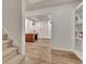 Basement with a wooden desk, carpeted stairs, hardwood floors, and built in shelves at 104 Hidden Springs Ln, Peachtree City, GA 30269