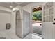 Basement offers a stainless fridge and access to the backyard at 104 Hidden Springs Ln, Peachtree City, GA 30269