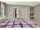 Well-lit bedroom, with doors to en suite bath and closet at 104 Hidden Springs Ln, Peachtree City, GA 30269