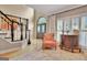 Inviting foyer showcases hardwood floors, staircase, and abundant natural light at 104 Hidden Springs Ln, Peachtree City, GA 30269