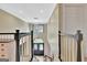 Elegant foyer with a chandelier, a double door and a view of the entrance at 104 Hidden Springs Ln, Peachtree City, GA 30269