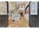 Spacious foyer with a soaring ceiling, hardwood floors, and elegant staircase at 104 Hidden Springs Ln, Peachtree City, GA 30269