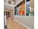 Hallway offers a view of the chandelier, staircase, and glass enclosed shelving at 104 Hidden Springs Ln, Peachtree City, GA 30269