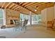 Enclosed patio with a stone fireplace and backyard view at 104 Hidden Springs Ln, Peachtree City, GA 30269