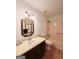 Well-lit bathroom featuring a vanity and a shower-tub combination at 1753 Brenda Dr, Jonesboro, GA 30236