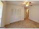 This bedroom features carpet flooring and a ceiling fan at 1753 Brenda Dr, Jonesboro, GA 30236
