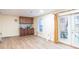 Basement with wood-look floors, cabinets, and a walkout door, perfect for entertaining at 402 Stonebrooke Dr, Auburn, GA 30011