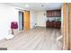 Spacious basement featuring wood-look floors, and a wooden sliding door at 402 Stonebrooke Dr, Auburn, GA 30011