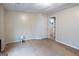 Cozy carpeted bedroom featuring a connecting door, creating a private retreat at 402 Stonebrooke Dr, Auburn, GA 30011