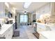 Bright kitchen with breakfast nook, modern appliances and farmhouse sink at 402 Stonebrooke Dr, Auburn, GA 30011
