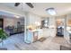 Bright kitchen with white cabinets, modern appliances, and stylish backsplash at 402 Stonebrooke Dr, Auburn, GA 30011