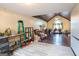Bright living room with vaulted ceilings, natural light, and an open layout at 402 Stonebrooke Dr, Auburn, GA 30011