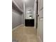 Additional bathroom space with a vanity, mirror, closet, and neutral flooring at 7560 Taylor Rd # 1, Riverdale, GA 30274