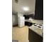 Features a modern kitchen with essential appliances and ample countertop space at 7560 Taylor Rd # 1, Riverdale, GA 30274
