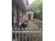 Backyard, showing side of house, shed, fence, and features of the yard at 212 Little Se St, Atlanta, GA 30315