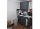 Functional kitchen featuring cabinetry, double sinks, and potential for a modern renovation at 212 Little Se St, Atlanta, GA 30315