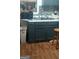 A functional kitchen features a range, sink, and appliances, ready for culinary adventures at 212 Little Se St, Atlanta, GA 30315