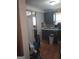 Kitchen ready for a transformation, featuring cabinetry, double sinks and wood flooring at 212 Little Se St, Atlanta, GA 30315