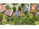 Aerial view of the home shows a shady, treed lot and surrounding neighborhood at 2009 Parador Aly, Mcdonough, GA 30253