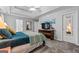 Comfortable main bedroom with neutral walls, tray ceilings, and en-suite bathroom at 2009 Parador Aly, Mcdonough, GA 30253